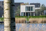 Exterior  Photo 3 of 14 in Wood and natural stone house in Amsterdam by derksen windt architecten
