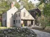 View of new side entrance to the house with addition in black.