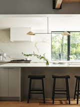 View of kitchen with island in foreground.