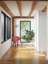 A small sitting area off of the mudroom.