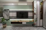 The livinf room TV Unit - 
The composition of the units with materials flowing over them, adds exuberant luxury & natural approach together to the space. 
