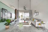 The living room-
A sense of symmetry, togetherness and a rhythm in materials, colours and textures has been achieved which makes the user connect with every smallest element of the house. 
The house speaks, you can hear it, you can feel it. 