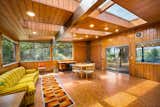 Living Room, Recessed Lighting, Terrazzo Floor, Gas Burning Fireplace, and Ceramic Tile Floor Solarium Addition toward Long Lake  Photo 16 of 51 in The Wallmark House by Moritz Kundig by Alice M Galeotti WA RE Lic 21106