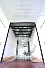 Doors, Interior, and Exterior Balcony into container loft  Photo 6 of 10 in Raynore Container Home by Chris R