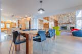 view from dining room with kitchen and living room beyond