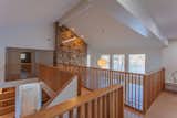 Bridge at upper level linking bedrooms