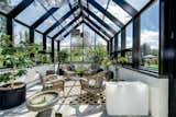 Fully functional, thermostatically controlled greenhouse for year-round use.