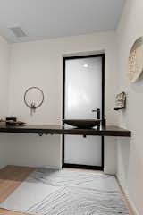 Powder room with privacy film activated