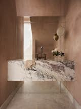 Bath Room, Marble Counter, and Pendant Lighting Powder room  Photo 1 of 16 in Family home in blush and bronze tones by Smac Studio