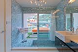 Sunken Master Bath Shower with soaking tub opens to backyard and outdoor king size bed for sleeping under the stars