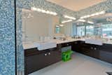 Master Bath carries the mosaic tiles from tub and shower