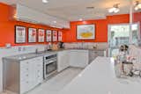 Kitchen and indoor bar area with plenty of storage and a private area for the chef to take a break between courses