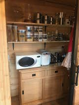 We wanted a work space in our pantry where we could store and use all of our smaller appliances, each one of them has its own plug. The floor is made from square bricks