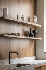 Kitchen, Stone Counter, Wood Cabinet, Wood Backsplashe, Open Cabinet, Drop In Sink, and Concrete Floor  Photo 4 of 20 in Garage transformation by Valérie Boerma