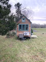 Exterior, House Building Type, Metal Roof Material, and Wood Siding Material Currently the home is perched at bucolic White Gate Farm for viewings.  Photo 6 of 10 in Roost Roadster Tiny House by Elizabeth Evans