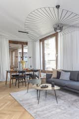 Living Room, Sofa, Light Hardwood Floor, End Tables, Coffee Tables, and Pendant Lighting Living room  Photo 13 of 15 in The Warsaw Brewery Apartment by Artur Balicki