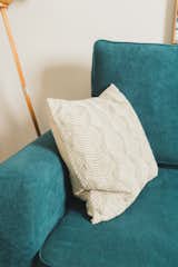 It's all about the details- like this decorative pillow which provides texture.   Photo 8 of 9 in San Diego Cool and Cozy Urban Oasis by Krystin Krebs