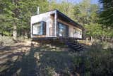 Exterior, Metal Roof Material, Wood Siding Material, Cabin Building Type, Flat RoofLine, and Glass Siding Material  Photo 4 of 34 in Pollux Refuge by Ruben Rivera Peede