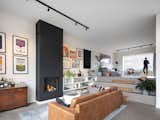 Living, Concrete, Standard Layout, Ottomans, Ceiling, Light Hardwood, Chair, Gas Burning, Sofa, and Track  Living Sofa Gas Burning Ceiling Photos from Black Timber Dykehouse