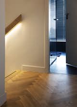 Hallway and Light Hardwood Floor  Photo 9 of 13 in Black Timber Dykehouse by Arjen Reas Architects