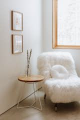 Bedroom reading corner - curl up with a book or gaze at the forest in this Icelandic sheepskin chair. 