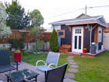 After photo of the completed cabana looking from the house. We painted it black to give the effect of a burnt charcoal finish.