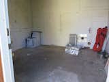 Before photo of the interior of the shed.
