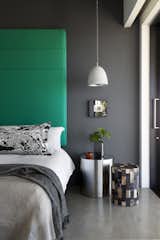 Bedroom, Bed, Night Stands, Pendant Lighting, Concrete Floor, and Ceiling Lighting Bedroom  Photo 1 of 14 in Fresnaye Pool Penthouse by Jenny Mills Architecture & Interiors