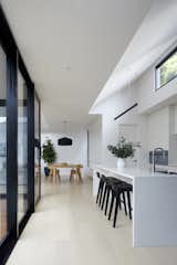 Kitchen & Dining Room with Raked Ceilings & High Window