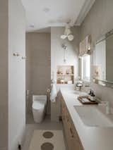 The master bathroom complements the bedroom with its neutral hues to provide a feeling of zen. 