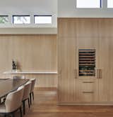 The interior palette incorporates natural elements in a minimalist design. 