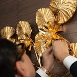 The bronze-and-gold-finish sculpture by Chrystiane Charles like the lotus on the lake