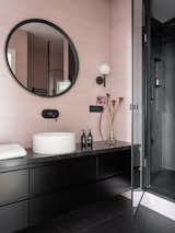 After the first meeting, the client told me that she was dreaming of a powdery bathroom. We found “that perfect pound tile” and diluted it with embossed black slabs.