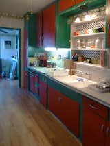 Before: east view of kitchen towards side door lobby