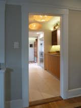 After: west view of kitchen towards side door lobby
