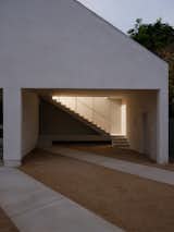 Stairway provides typological intrigue to the secreted upstairs unit