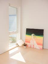 Living room still life with painting by Allison Schulnik
