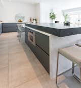 Kitchen design detail of a unique 4-inch quartz countertop