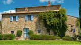 Exterior, Farmhouse Building Type, Tile Roof Material, Stone Siding Material, and House Building Type Tuscany Style brick home  Photo 2 of 11 in Villa Caccianello by Linda Yaccarino