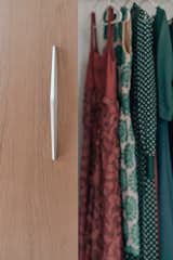Details around every corner. Here the boomerang door handles stand out against the wood closet doors. 