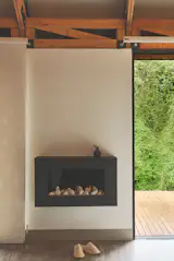 A gas fireplace creates a cozy interior.