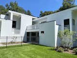 Exterior, House Building Type, Wood Siding Material, and Flat RoofLine Exterior from the side  Photo 7 of 15 in A Gut Renovated MidCentury Modern Green Energy Home for Luxury Winter Living for $4.65m by Betty McDowell