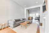 Living Room, Light Hardwood Floor, Sofa, Standard Layout Fireplace, and Recessed Lighting  Photo 9 of 26 in Harlan-Bogan House by Matthew Warner