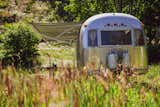 Bolden feels good about having blended the old and the new, too. “I could build a new trailer or a new house, but I love taking these beautiful old things that are still functional and having them be the vehicle for this type of interior work,” he says.
