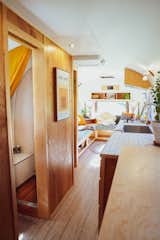 The bathroom was moved to the middle of the trailer to maximize privacy for the sleeping quarters, and provide a feeling of separateness from the front lounge area.