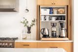 A home for coffee, knives, a KitchenAid mixer, and even compost was designated before demo began. A welcome purging of unused items and an intentional inventory of what was left allowed this kitchen to be hyper-organized and clutter-free.