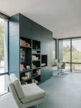 Tile, Texas Stone, and Concrete Rule in This Soaring Houston Home - Photo 6 of 15 - 