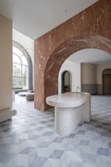 The addition of the arch between the foyer and tearoom softly redefines the two spaces