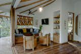 Cute living room in the Moon treehouse, with custom build wooden louvres to create the feel of indoor/outdoor living.