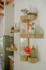 The treehouses contain many natural elements, including live-edge shelves. 